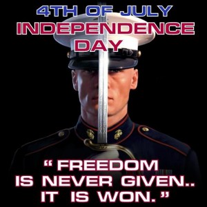 A US Marine in full dress, with a sword in front of his face, with the caption “4th of July, Independence Day. Freedom is never given...it is won.”